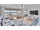 Comfortable living room featuring floor-to-ceiling windows with a scenic city and water view at 100 Bluff View Dr # 510A, Belleair Bluffs, FL 33770