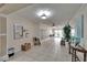 Inviting lobby entrance with tile floors, seating, and mailboxes at 100 Bluff View Dr # 510A, Belleair Bluffs, FL 33770