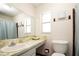 Compact bathroom with a stylish vanity, updated fixtures, and natural light at 10035 82Nd St, Seminole, FL 33777