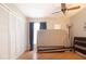 Bedroom with closet, ceiling fan, and natural light at 10035 82Nd St, Seminole, FL 33777