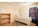 Simple bedroom featuring hardwood floors, ceiling fan and comfortable bed at 10035 82Nd St, Seminole, FL 33777