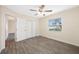 Bedroom with wood-look tile flooring and ceiling fan at 1113 53Rd S St, Gulfport, FL 33707