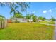 Charming single-story home boasting a lush front yard with mature landscaping and inviting curb appeal at 1113 53Rd S St, Gulfport, FL 33707