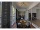 Enclosed balcony features large windows, table with chairs, overlooking the interior space and outdoor view at 11520 Shipwatch Dr # 1385, Largo, FL 33774