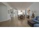 Open concept dining area with stylish table and chairs, seamlessly connected to the kitchen and living spaces at 11520 Shipwatch Dr # 1385, Largo, FL 33774