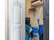 Storage closet stocked with beach chairs, towels, and other beach necessities at 11605 Gulf Blvd # 203, Treasure Island, FL 33706