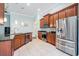 Well-equipped kitchen with stainless steel appliances, granite countertops, and ample cabinet space at 12107 Rambling Stream Dr, Riverview, FL 33569