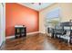 Office space with wood floors, a large window and an accent wall at 12107 Rambling Stream Dr, Riverview, FL 33569