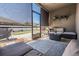 Screened patio with patio furniture and view of the backyard at 12107 Rambling Stream Dr, Riverview, FL 33569