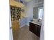 Bathroom featuring a sink vanity and a shower with a patterned curtain at 13813 Mission Oaks Blvd, Seminole, FL 33776
