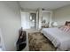Bedroom with access to ensuite bathroom and mirrored closets at 13813 Mission Oaks Blvd, Seminole, FL 33776