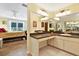 Bathroom vanity with double sinks next to bedroom at 13902 Bardmoor Pl # B, Tampa, FL 33618