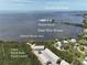 Desirable waterfront condos feature a kayak launch, natural beach area, and panoramic bay views of Sunset Beach at 1500 Sunset Rd # C7, Tarpon Springs, FL 34689