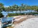Shell covered seating area at community beach at 1500 Sunset Rd # C7, Tarpon Springs, FL 34689