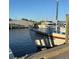 Close-up of a boat with 'Tarpon Springs' written on it, docked near other yachts at 1500 Sunset Rd # C7, Tarpon Springs, FL 34689