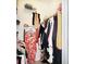 Well-organized walk-in closet with ample shelving and hanging space for clothes and accessories at 1500 Sunset Rd # C7, Tarpon Springs, FL 34689