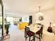 Bright and airy living space seamlessly combines dining and lounging areas, perfect for entertaining at 1500 Sunset Rd # C7, Tarpon Springs, FL 34689