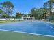 Community tennis court is ready for play, perfect for active residents and social gatherings at 1500 Sunset Rd # C7, Tarpon Springs, FL 34689