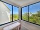 Scenic view from the sitting area, showcasing lush greenery and glimpses of the water at 1500 Sunset Rd # C7, Tarpon Springs, FL 34689