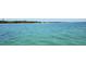 Beautiful waterfront property with scenic views of the ocean and lush greenery at 1500 Sunset Rd # C7, Tarpon Springs, FL 34689