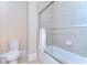 Bathroom with tiled shower/tub combination and modern fixtures at 15305 Fishhawk Preserve Dr, Lithia, FL 33547