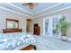 Bedroom featuring a spacious layout, neutral tones, and natural light to create a relaxing retreat at 15305 Fishhawk Preserve Dr, Lithia, FL 33547