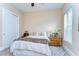 Bright bedroom with neutral walls, plush carpet, and cozy furnishings at 15305 Fishhawk Preserve Dr, Lithia, FL 33547