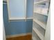 Well-organized closet with shelving and hanging space, offering ample storage solutions at 15400 Gulf Blvd # 502, Madeira Beach, FL 33708