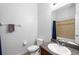 Clean, functional bathroom with a shower-tub combo and a well-lit vanity area at 16621 Kingletside Ct, Lithia, FL 33547