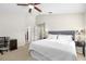 Spacious bedroom with neutral walls, ceiling fan, and carpet flooring at 16621 Kingletside Ct, Lithia, FL 33547
