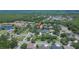 Aerial view of neighborhood with lake, ponds, and wooded areas at 20537 Lace Cascade Rd, Land O Lakes, FL 34637