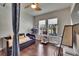 Bright bedroom featuring modern lighting, a day bed and a window letting in natural light at 20537 Lace Cascade Rd, Land O Lakes, FL 34637