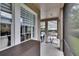 Covered patio featuring a hammock and outdoor seating area, perfect for relaxation and enjoying the outdoors at 20537 Lace Cascade Rd, Land O Lakes, FL 34637