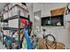 Organized garage area with storage shelving and various household items at 20537 Lace Cascade Rd, Land O Lakes, FL 34637