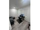 Home office setup with desk, computer, and comfortable seating area, offering a functional workspace at 2108 E 22Nd Ave # 1, Tampa, FL 33605