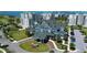 Aerial shot of the building with a beautiful view of the coast and golf course at 220 Belleview Blvd # 104, Belleair, FL 33756