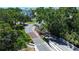 View from within a gated community lush with landscaping featuring a guardhouse and secure entrance, ensuring privacy at 220 Belleview Blvd # 104, Belleair, FL 33756