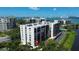 Waterfront condo showcasing views, modern design and tranquil water views, creating a desirable living environment at 220 Belleview Blvd # 104, Belleair, FL 33756