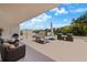 Relaxing outdoor patio with comfortable lounge seating and a pool table at 220 Belleview Blvd # 104, Belleair, FL 33756