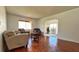 Inviting living room with hardwood floors, comfortable seating, and plenty of natural light at 2459 Bay Berry Dr, Clearwater, FL 33763