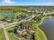 Welcome to this community, seen from above, with serene ponds and manicured landscaping at 2495 Oakwood Preserve Dr, Wesley Chapel, FL 33543