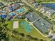 Community amenities include a sand volleyball court, tennis courts, and basketball court from above at 2495 Oakwood Preserve Dr, Wesley Chapel, FL 33543