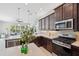 Gourmet kitchen featuring stainless steel appliances and quartz countertops at 2495 Oakwood Preserve Dr, Wesley Chapel, FL 33543