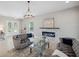 Elegant living room with modern fireplace and stylish furniture at 2495 Oakwood Preserve Dr, Wesley Chapel, FL 33543