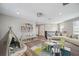 Playful loft area with teepee, shelving, and seating, creating a fun and inviting space for children at 2495 Oakwood Preserve Dr, Wesley Chapel, FL 33543