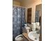Practical bathroom with a shower, toilet, and sink, suitable for everyday use at 3206 W Azeele St # 218, Tampa, FL 33609