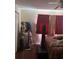 This bedroom offers natural light, hardwood floors, and plenty of space for relaxing at 3206 W Azeele St # 218, Tampa, FL 33609