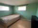 Cozy bedroom with a bed, windows, and closet at 3330 Monticello St, Holiday, FL 34690