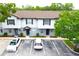 Aerial view of townhomes with designated parking spaces and manicured landscaping at 4332 Har Paul Cir, Tampa, FL 33614