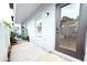 A small patio area featuring white gravel, direct access, and a partial view of the interior through the door at 4332 Har Paul Cir, Tampa, FL 33614